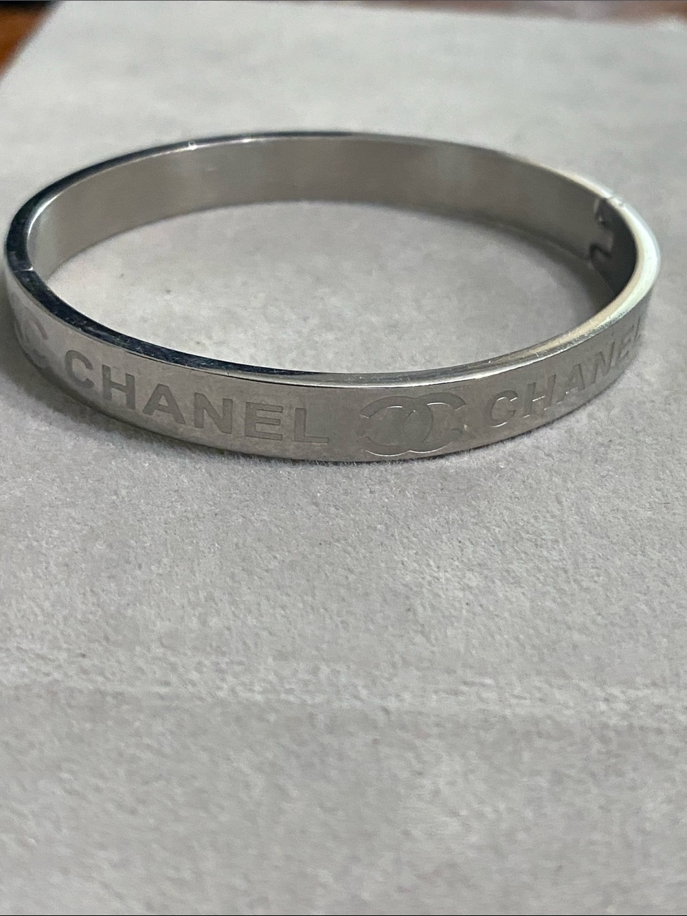 CHANEL Silver-Tone Logo Slim Bangle